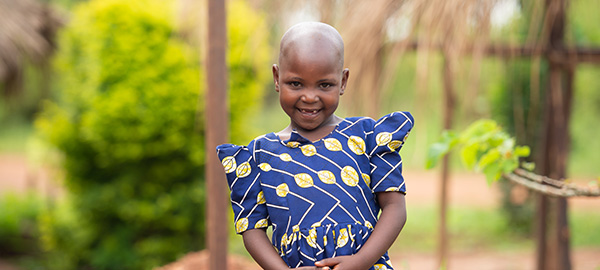 a girl smiles at the camera