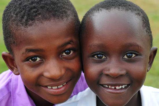 A boy and girl smiling