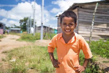 A young boy smiling