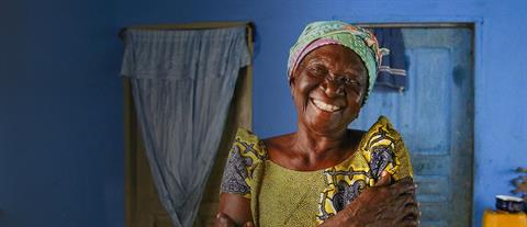 A smiling elderly woman