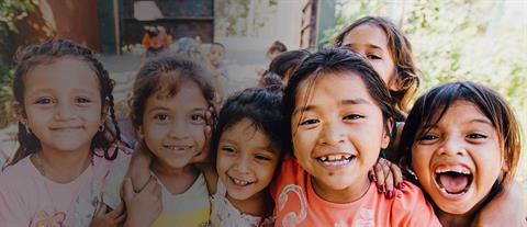 Five smiling and laughing girls