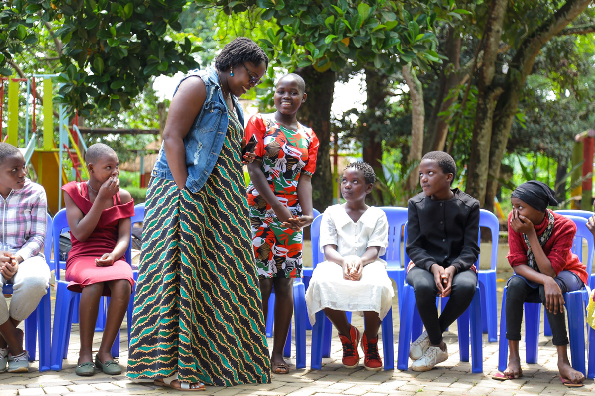 Doreen talks with young girls