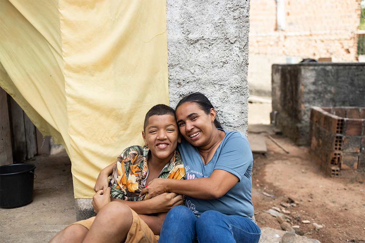 Patricia hugs her son Wesley