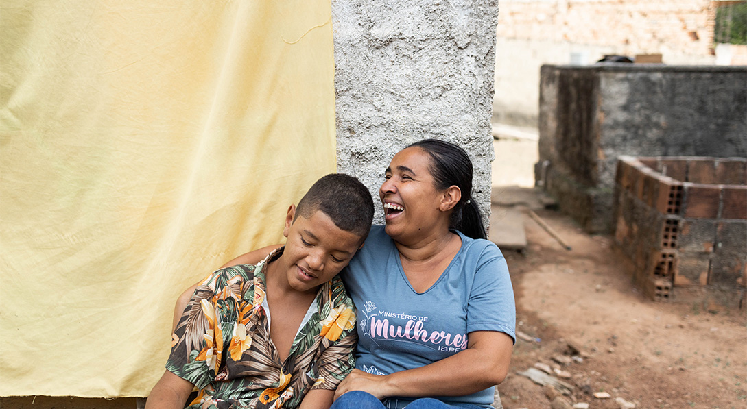 Patricia and her son Wesley sit together