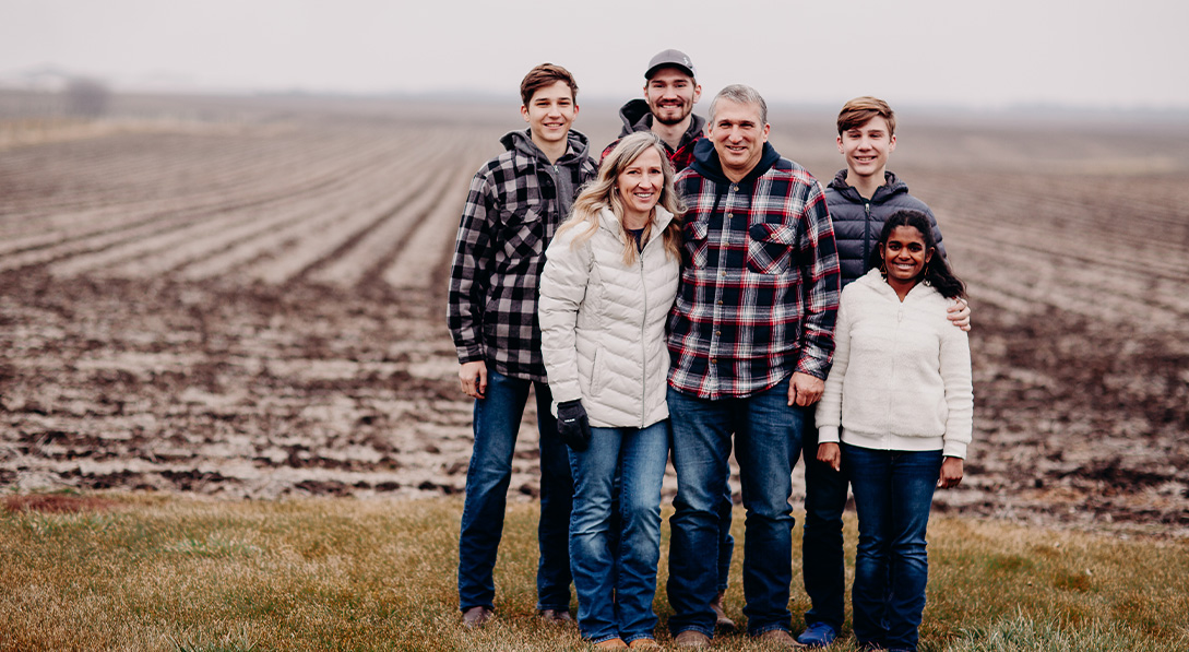 The family that sponsored Maisha, from left: Caleb, Kristy, Ethan, Kevin, Levi and Muskan.