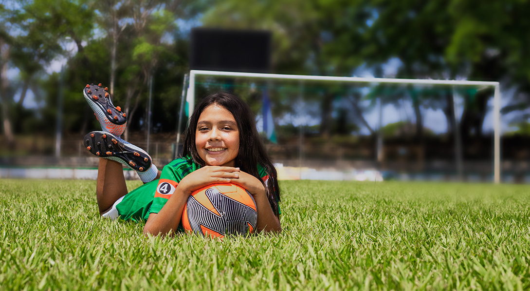 Karla from El Salvador plays soccer.