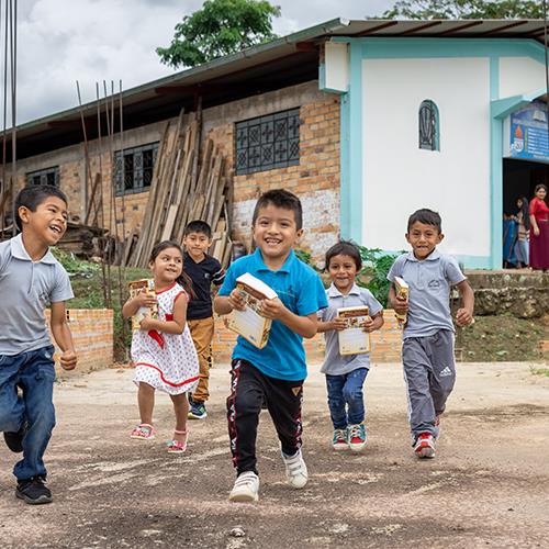 Children running and smiling