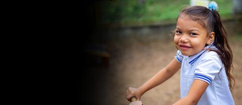 A girl riding a bike