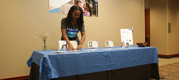 Hosts at a Compassion Sunday table