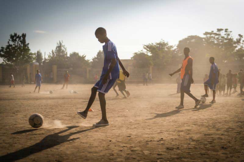 Children playing soccer