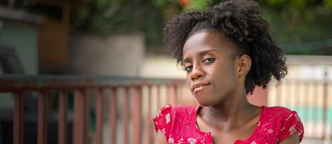 A girl standing outside