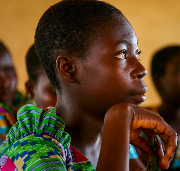 A young girl learning in school