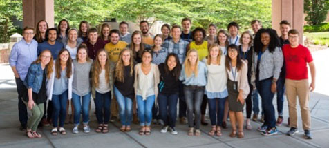 Group of Compassion employees pose for picture