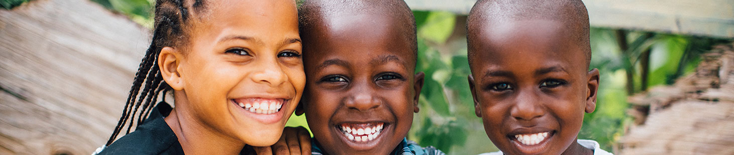 three smiling children