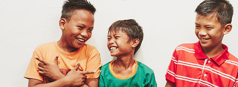 Three smiling boys