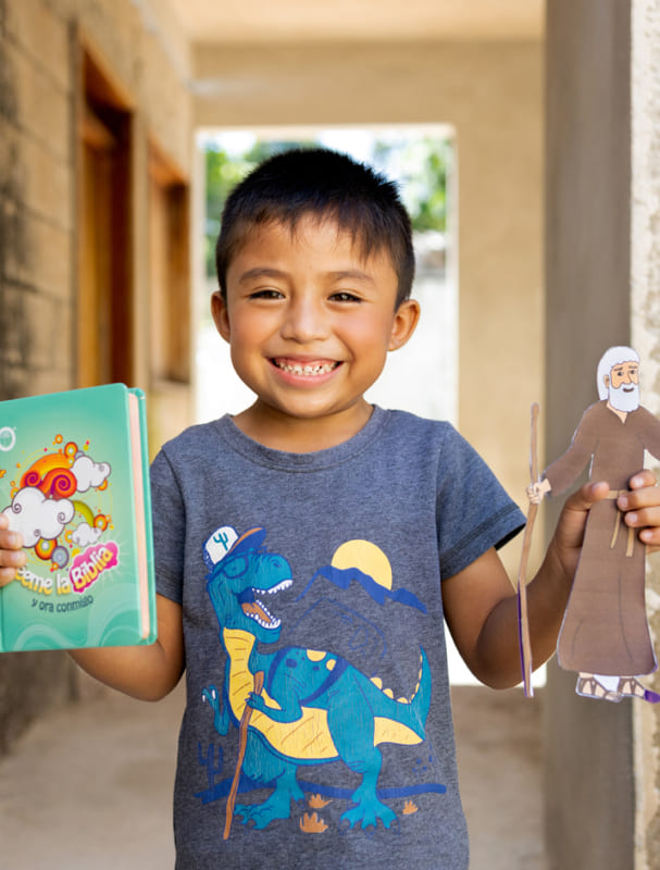 kid holding a Bible