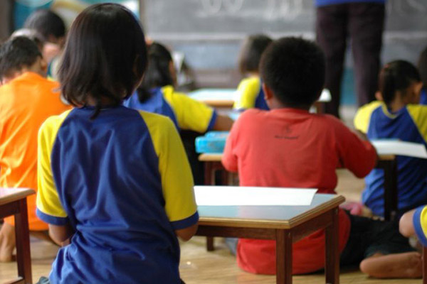 Chidren learning in their classroom