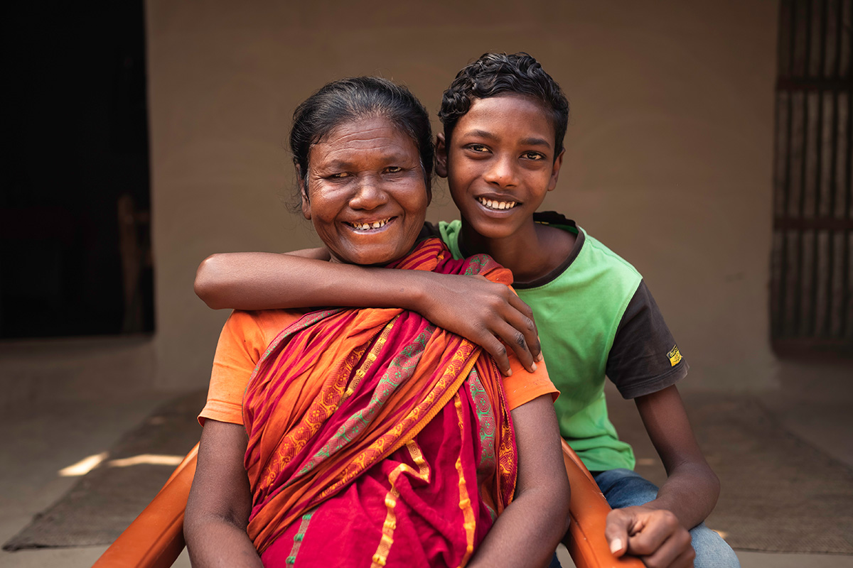 two girls looking at camera and smiling