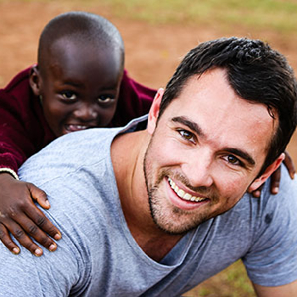 a man and girl with their foreheads touched together