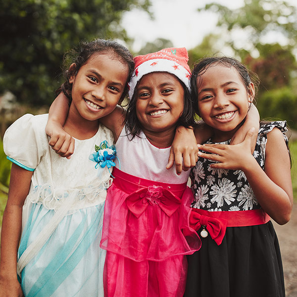 three smiling girls