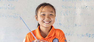 A young girl excited for class 