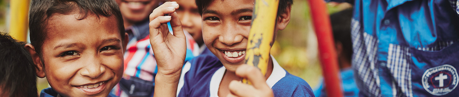 Students all playing and smiling