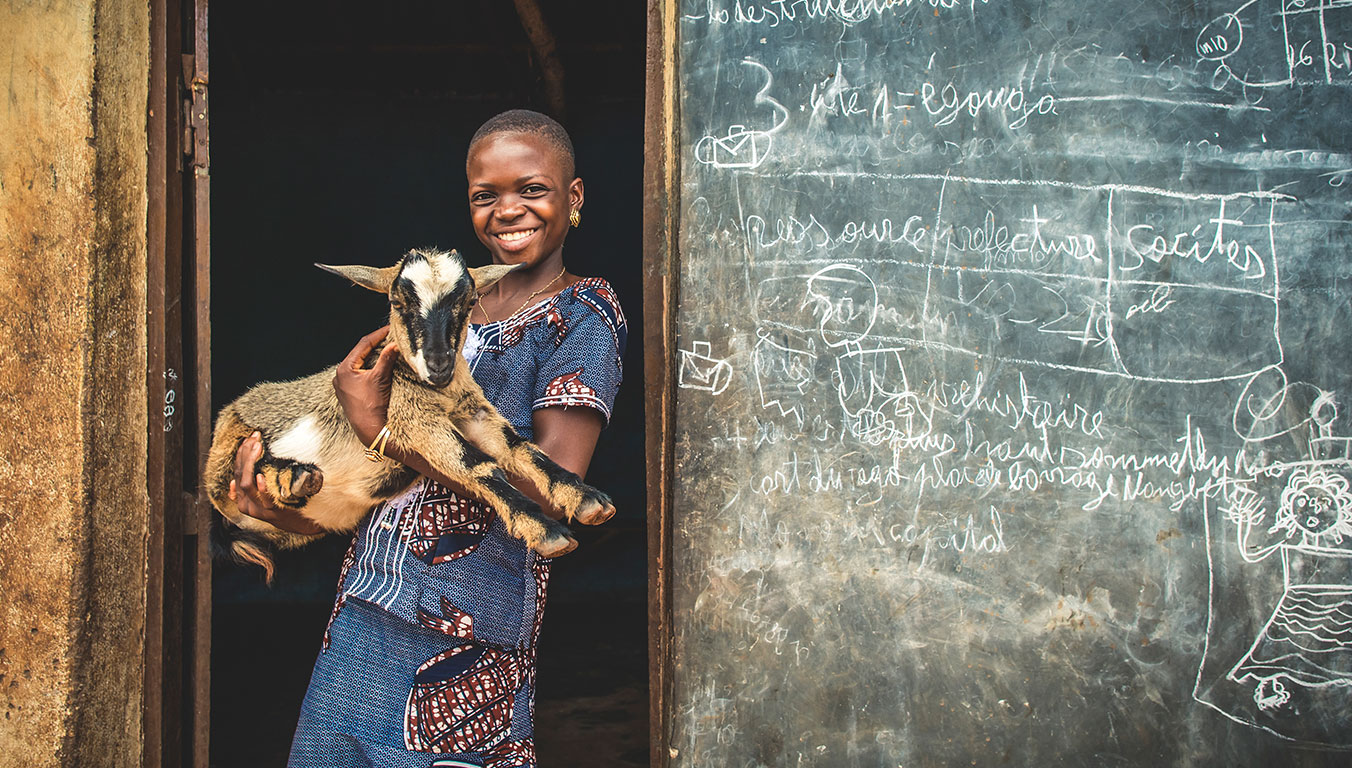 Ablavi holds one of her family’s goats