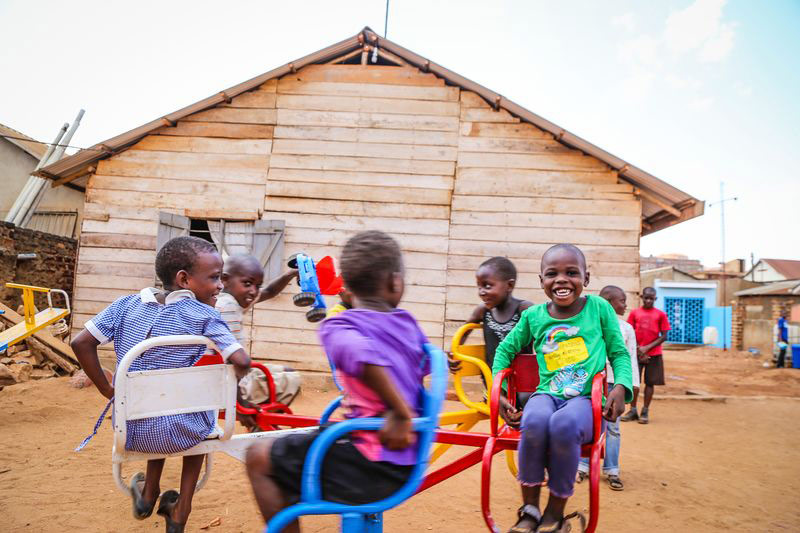 A group of children play on a playground