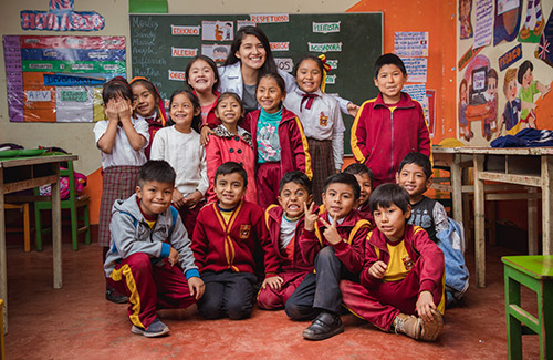 a group of children and their teacher