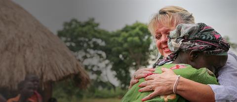 Two women hugging
