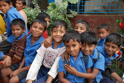 a group of kids pose for a picture